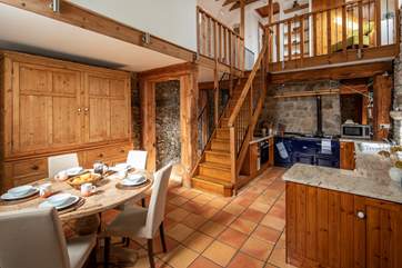 Whipping up a feast in this charming kitchen and dining space is a real pleasure.