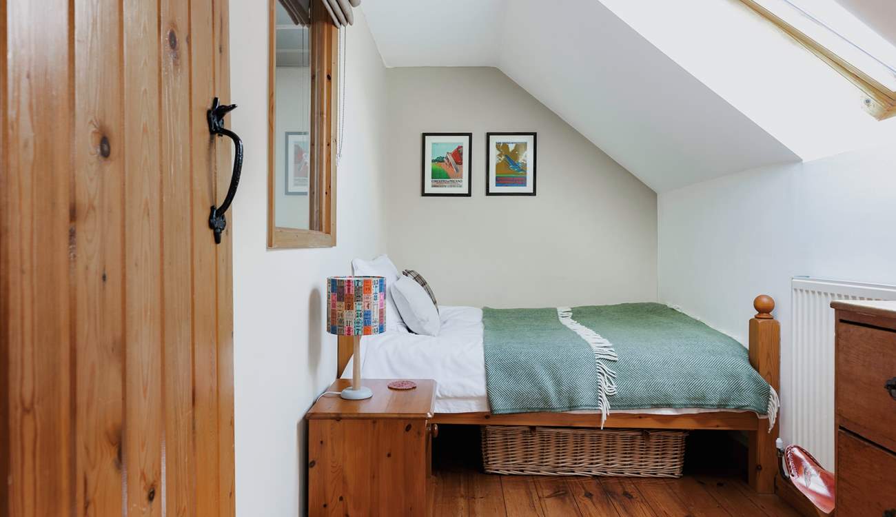 Bedroom 3 is perfect just for one. The slightly smaller double bed has standard width, just the length is slightly shorter to fit into this charming space.