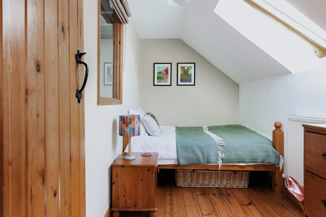 Bedroom 3 is perfect just for one. The slightly smaller double bed has standard width, just the length is slightly shorter to fit into this charming space.