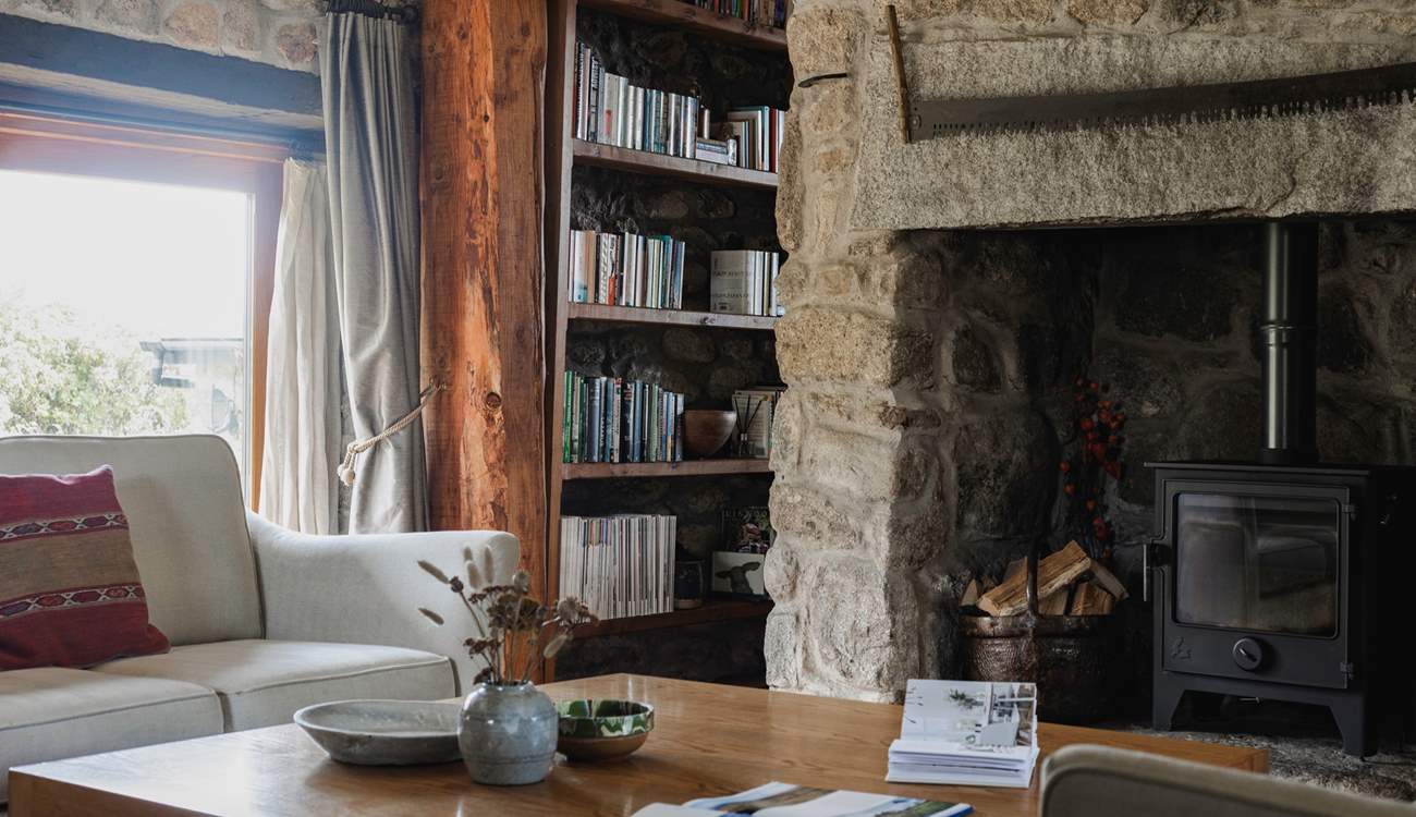 The sitting-room offers oodles of comfy seating and a generous sized coffee table.