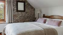 Bedroom 1 is one of three exceptionally inviting and comfy bedrooms.