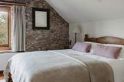 Bedroom 1 is one of three exceptionally inviting and comfy bedrooms.