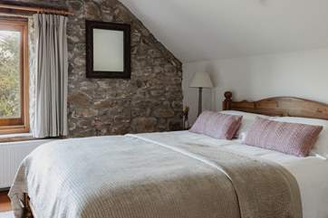 Bedroom 1 is one of three exceptionally inviting and comfy bedrooms.