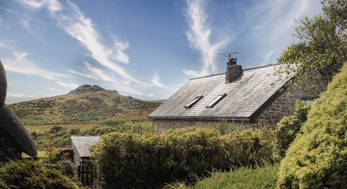 The gardens have magnificent views of Sharp Tor.