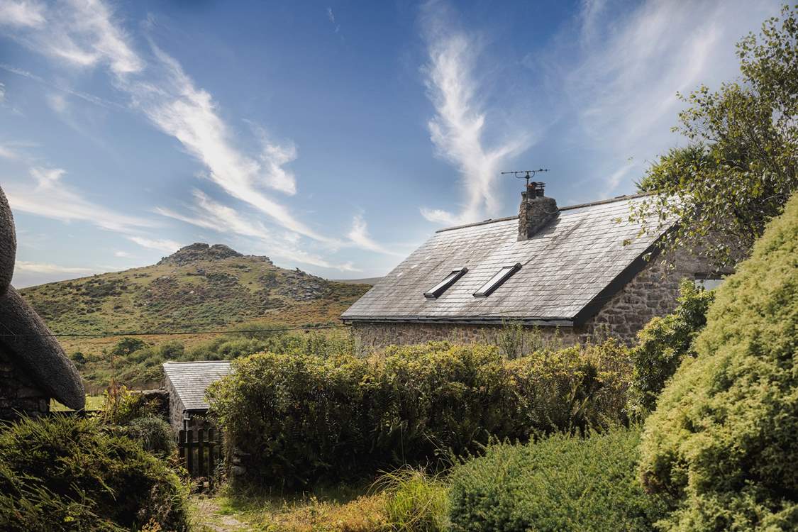 The gardens have magnificent views of Sharp Tor.
