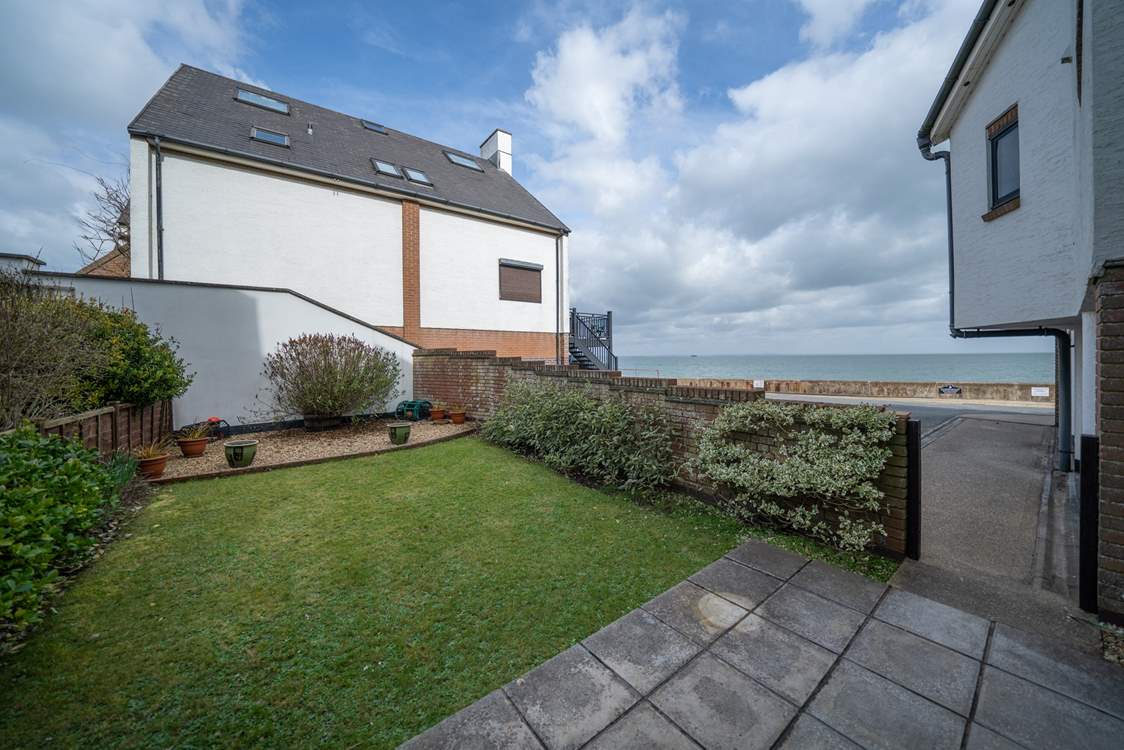 The garden with views of the Solent, is a real sun-trap during the summer months.