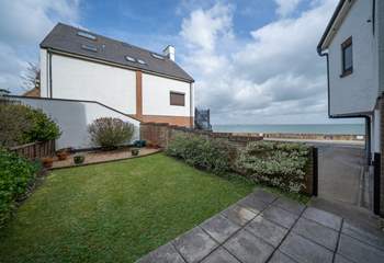 The garden with views of the Solent, is a real sun-trap during the summer months.