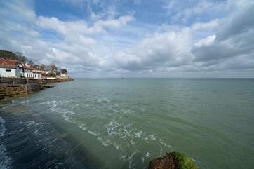 Admire the ships sailing across the Solent!