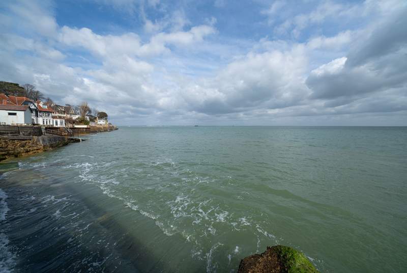 Admire the ships sailing across the Solent!