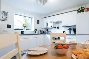 Gather around the dining-table for breakfast before heading out for a dip in the sea!