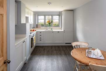 The kitchen has lovely views out over the countryside.