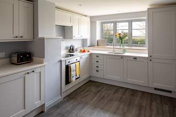Large and well-equipped kitchen.