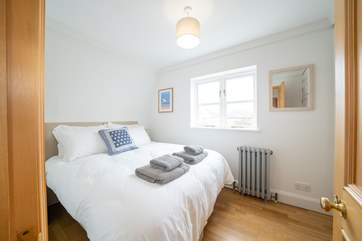 The second bedroom on the first floor with 'zip and link' king-size double or twin beds. Please note the 2'6'' twin beds are recommended for children only.