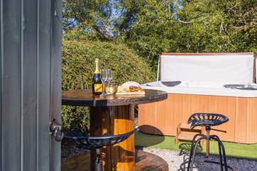 You are surrounded by countryside. Relax in the hot tub while listening to the babbling stream.