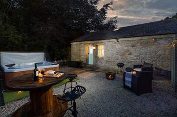 Watch the stars from your hot tub or toast marshmallows on the fire-pit.