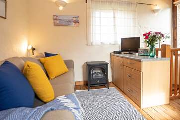 Cuddle up, switch on the electric wood-burner effect stove and relax.