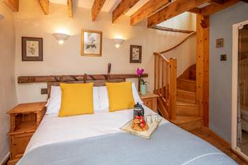 Cosy and cute bedroom. The perfect setting to snuggle up in after a day of adventure.