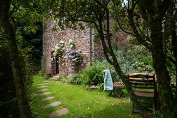 The Little Cottage is nestled away in this super romantic setting.