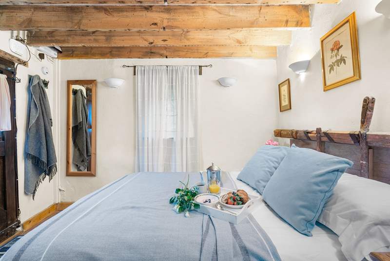 Cosy and cute bedroom. The perfect setting to snuggle up in after a day of adventure.