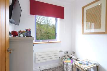 The snug/playroom/cot room, next to bedroom 2, is perfect for the little ones.