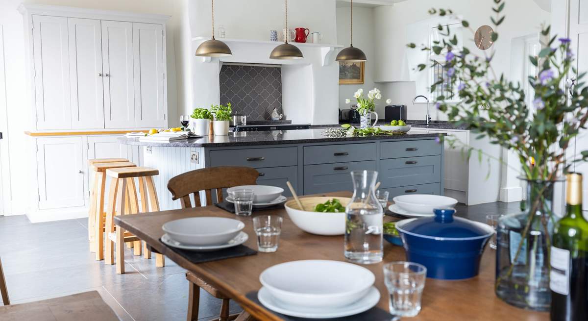 The fabulous open plan kitchen and dining area is a wonderful space to feast like kings.