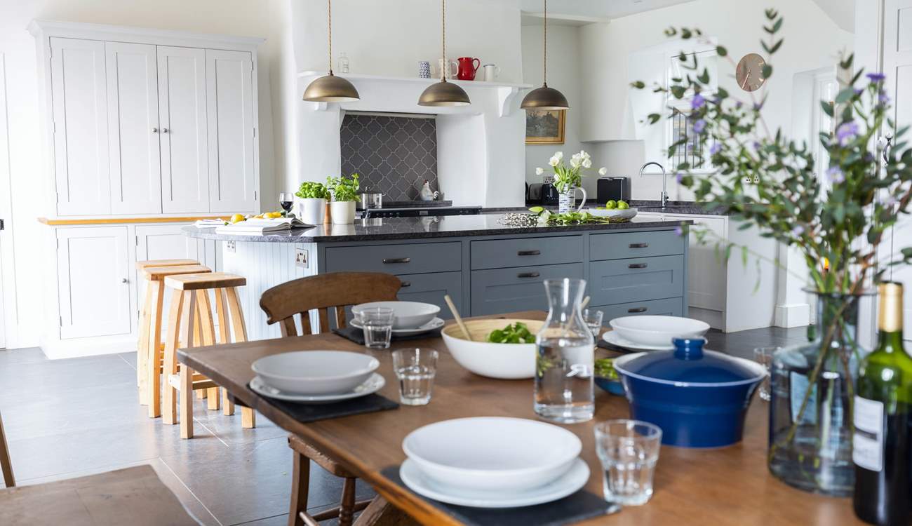 The fabulous open plan kitchen and dining area is a wonderful space to feast like kings.