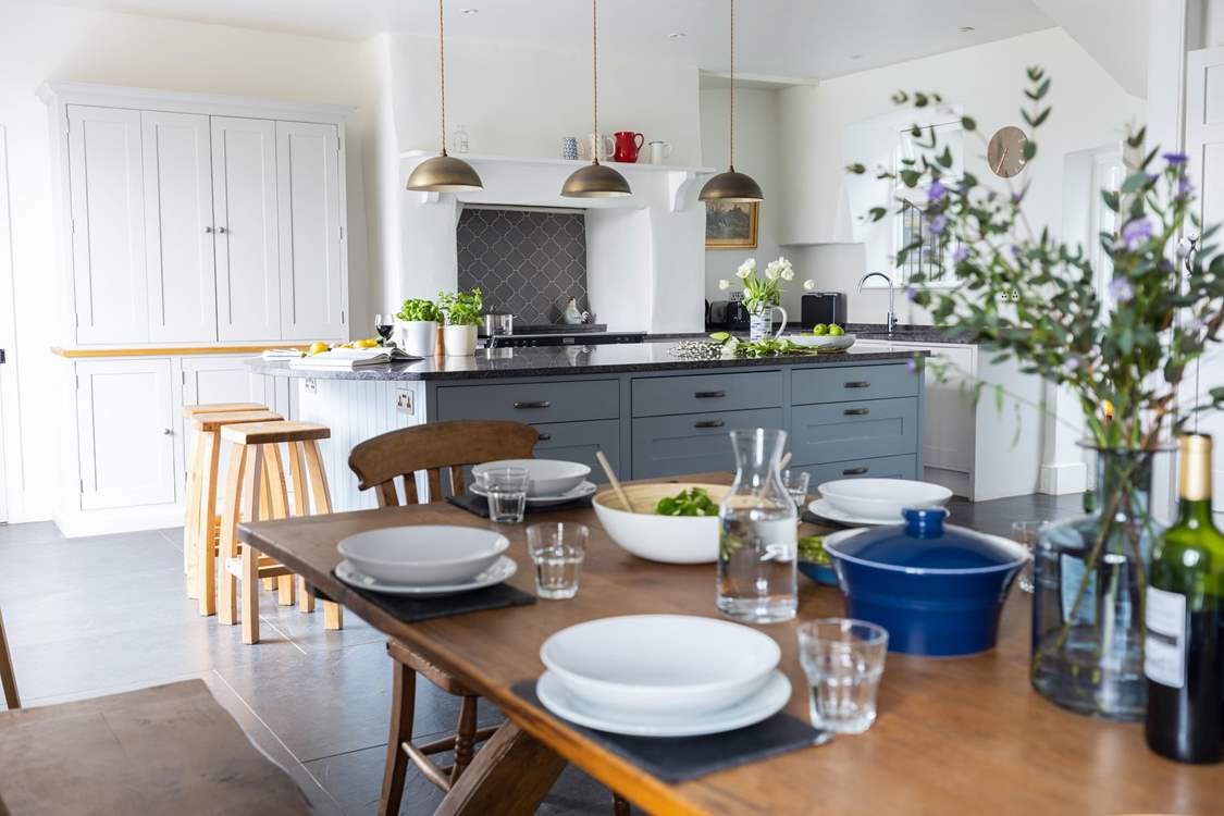 The fabulous open plan kitchen and dining area is a wonderful space to feast like kings.