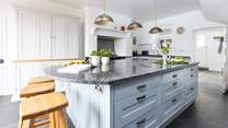 The kitchen offers a wonderful space to whip up a feast or enjoy a glass of something tasty together.
