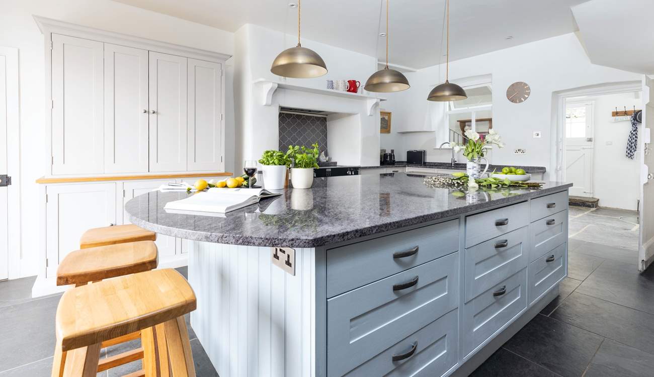 The kitchen offers a wonderful space to whip up a feast or enjoy a glass of something tasty together.