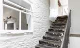 These steps lead down from the front door and games-room into the main ground floor entrance hall. However, there is also flat access into the property for those who don't fancy the steps. - Thumbnail Image