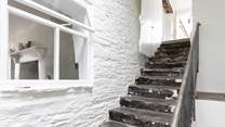 These steps lead down from the front door and games-room into the main ground floor entrance hall. However, there is also flat access into the property for those who don't fancy the steps.