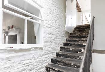 These steps lead down from the front door and games-room into the main ground floor entrance hall. However, there is also flat access into the property for those who don't fancy the steps.