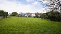 What a fabulous lawn. So much space! Great for a game of football, cricket, or rounders.
