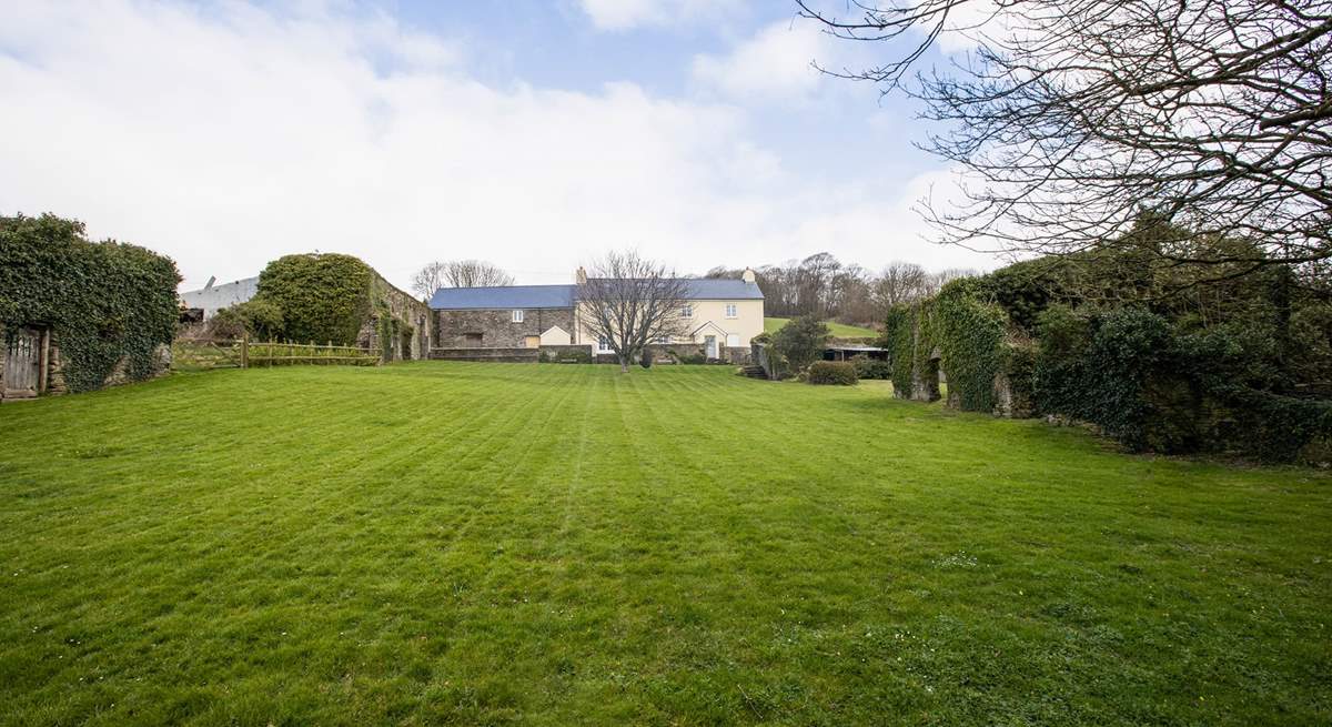 What a fabulous lawn. So much space! Great for a game of football, cricket, or rounders.