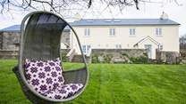 Many lazy days can be spent in the beautiful lawned area.