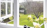 Bedroom 4 and the stunning view out over the lawn and the rolling countryside and hills of the South Hams. - Thumbnail Image