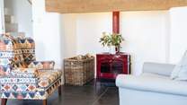 The open plan kitchen and dining area even has a snug area to relax in.