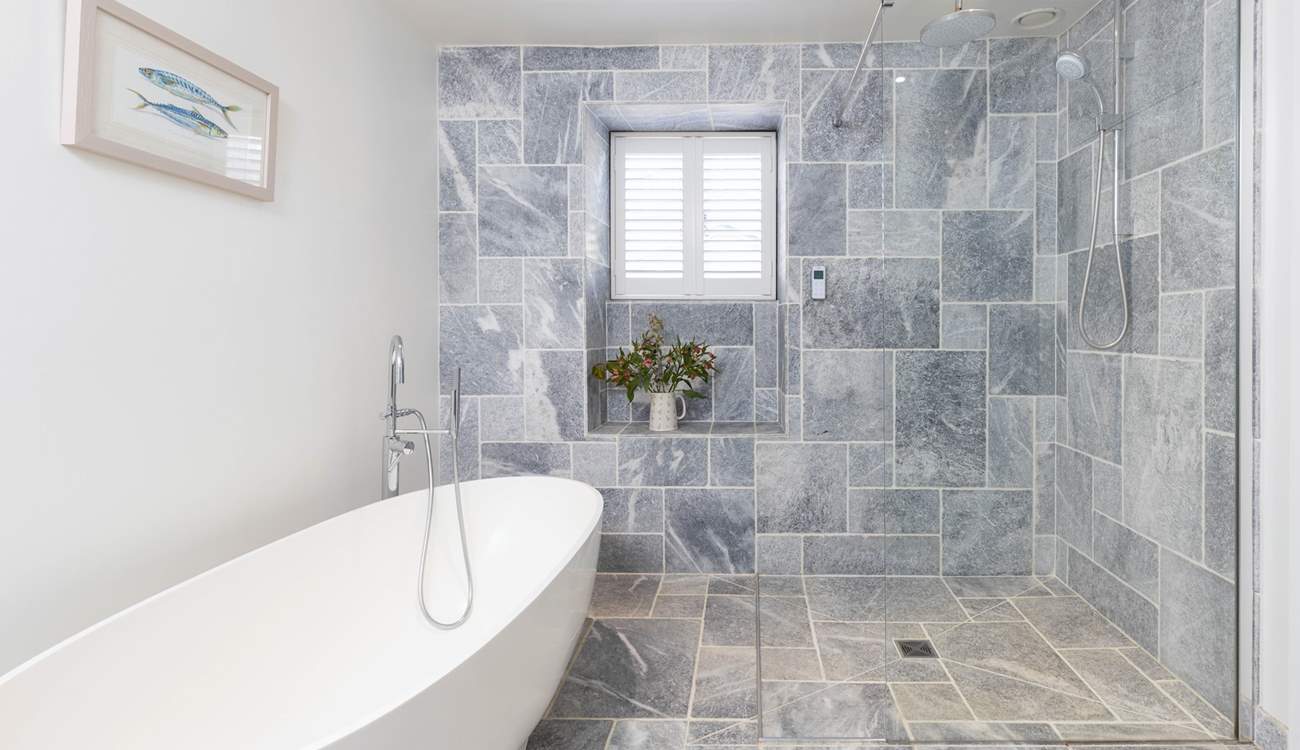 What a glorious family bathroom. Good luck getting the little ones out of that bath!
