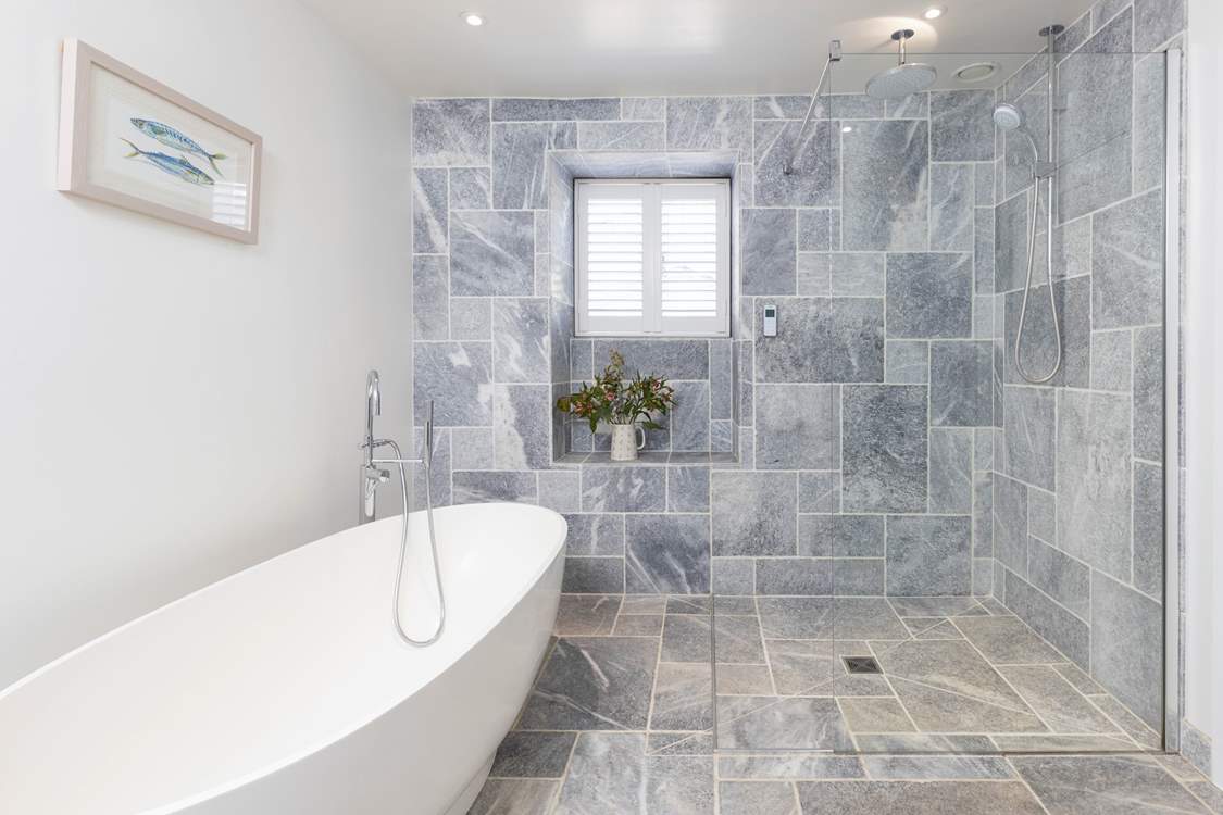 What a glorious family bathroom. Good luck getting the little ones out of that bath!