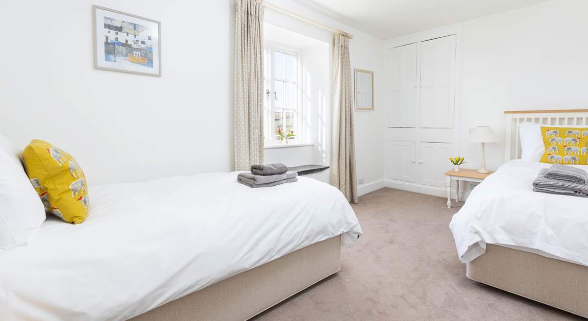 Bedroom 4 offers these delightful twin beds.