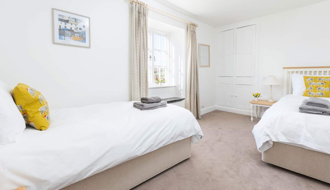 Bedroom 4 offers these delightful twin beds.