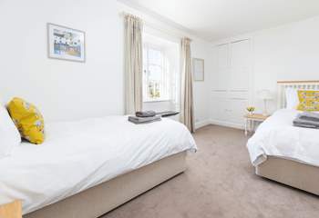 Bedroom 4 offers these delightful twin beds.