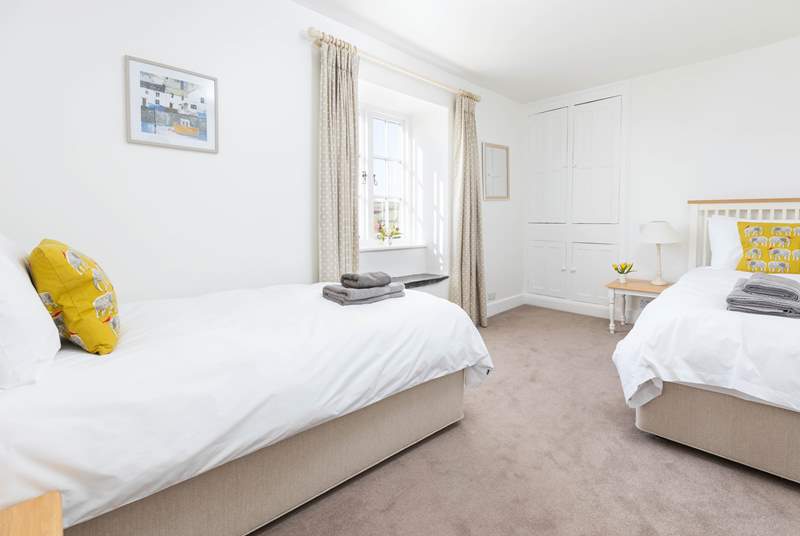 Bedroom 4 offers these delightful twin beds.