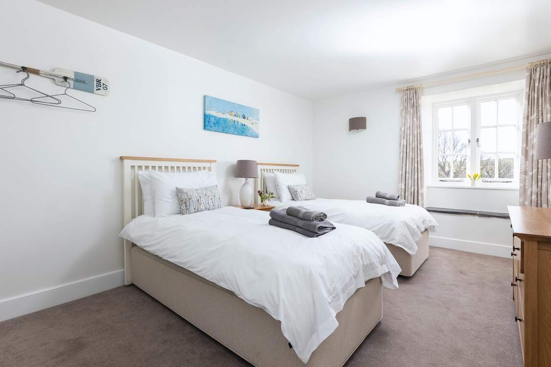 Bedroom 5 is super cute and welcoming.