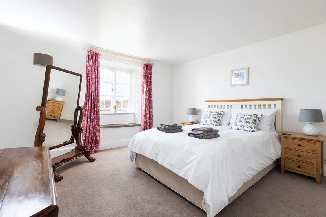 Spacious bedroom 3 is home to this comfy king-size bed.