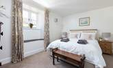 Bedroom 2 is light, airy, and super welcoming. - Thumbnail Image