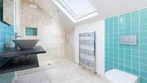 The glorious family shower-room is just the ticket for washing the day's sand and sun cream away.