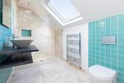 The glorious family shower-room is just the ticket for washing the day's sand and sun cream away.