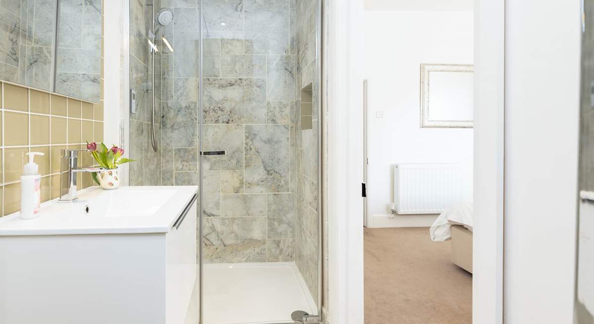 Bedroom 1 boasts this very stylish en suite shower-room.