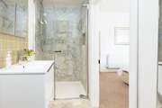 Bedroom 1 boasts this very stylish en suite shower-room.